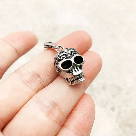 Silver skull pendant.