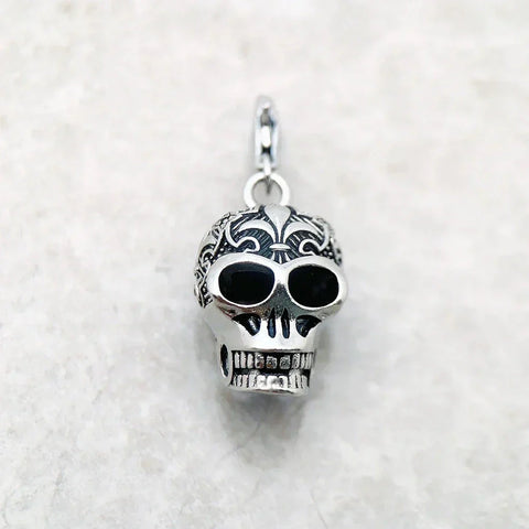 Silver skull pendant.