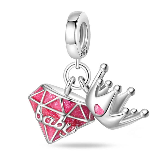 Royal Baby Crown Charm with Pink Diamond and Silver Finish - Royal baby crown charm with pink enamel and diamond-like details.