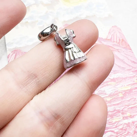 Silver and pink dress charm.