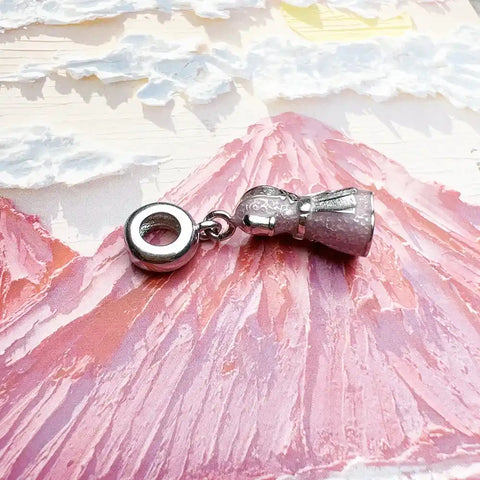 Silver charm bracelet bead.