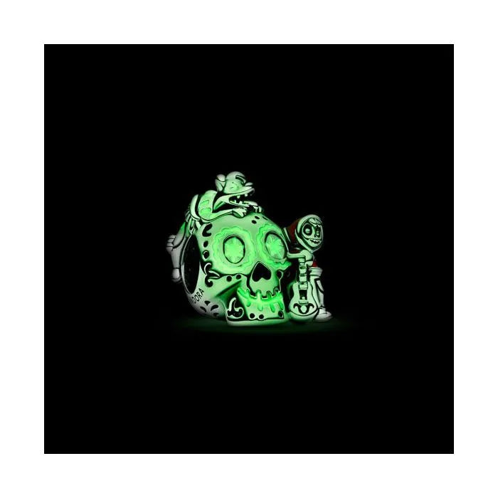 Glow-in-the-dark sugar skull charm with colorful enamel and character figures in sterling silver.