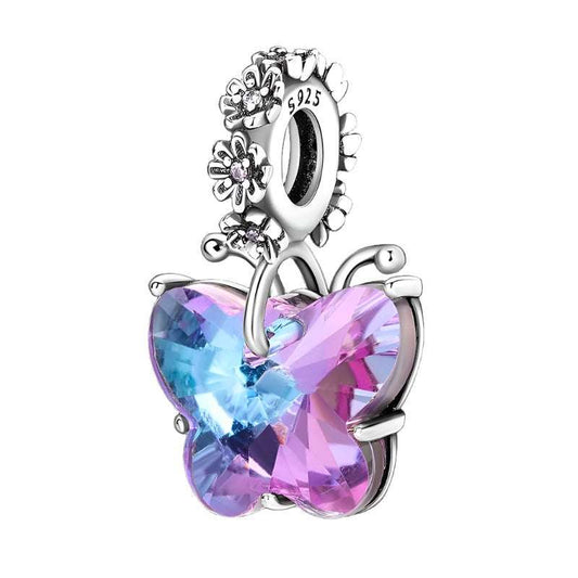 Sterling silver butterfly charm with blue and pink crystals, fits Pandora bracelets.