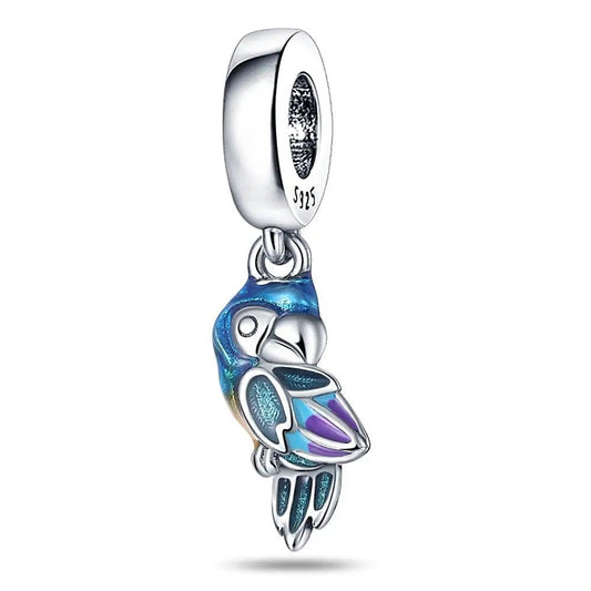 Sterling silver parrot charm for bracelets with colorful enamel detailing.