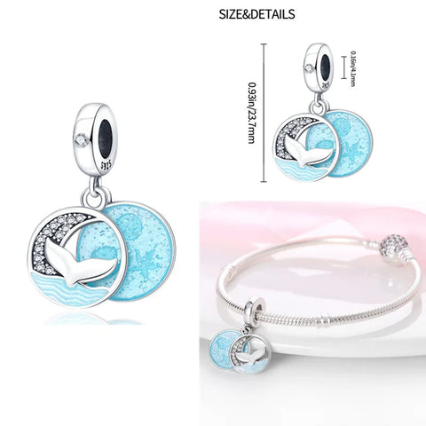 Double Disc Charm with Flying Bird and Blue Enamel, Fits Pandora - Sterling silver double disc charm with a flying bird and blue enamel background.