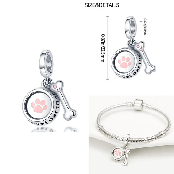 Sterling Silver Loyal Partner Dog Charm with Bone for Pandora Bracelets - "Loyal Partner" charm in sterling silver featuring a pink paw print and bone with pink stones, compatible with Pandora bracelets.