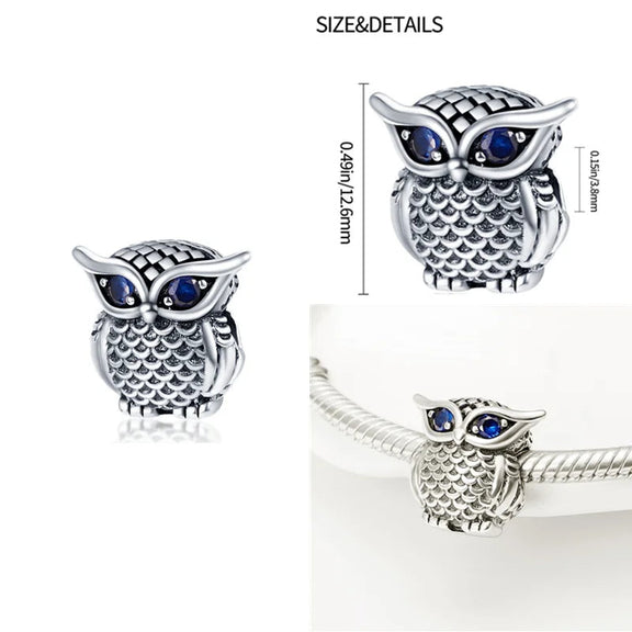 Owl Charm with Sapphire Eyes for Wisdom - Sterling silver owl charm with sparkling sapphire blue eyes for Pandora bracelets.