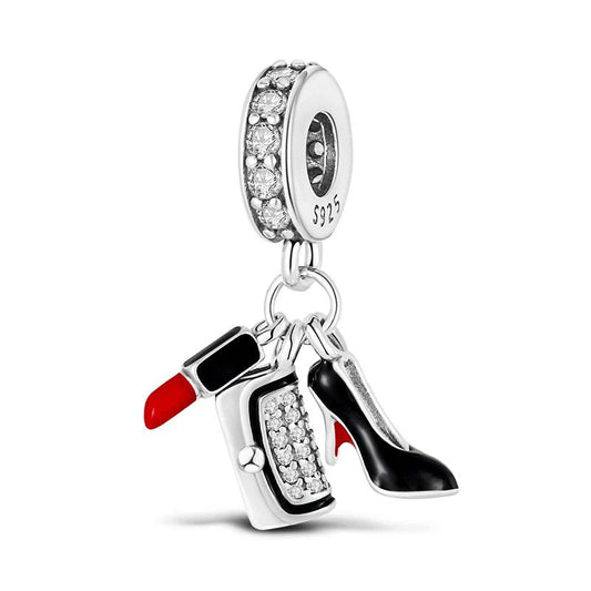 Sterling silver charm with lipstick, handbag, and high heel shoe