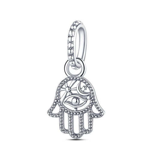 Intricate sterling silver Hamsa Hand charm with evil eye design.