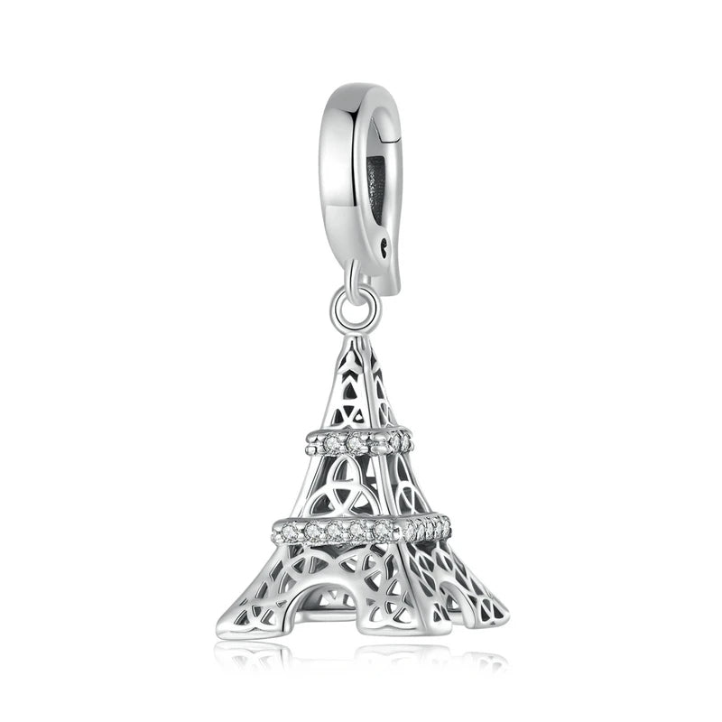 Sterling silver Eiffel Tower charm with rhinestone bands.