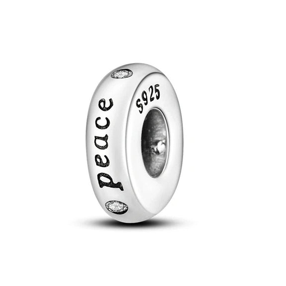 Sterling Silver Peace Spacer Charm with Engraving - Sterling silver peace spacer charm with engraving and gem accents.