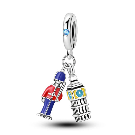 London Guard and Big Ben Sterling Silver Charm with Enamel Accents - Sterling silver charm with enamel London Guard and Big Ben, featuband a blue gemstone on the bail.