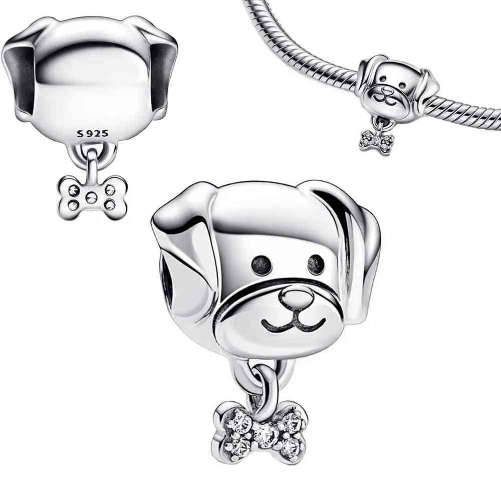 Sterling silver puppy face charm with dangling bone, fits Pandora bracelet.