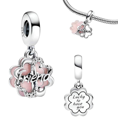 Sterling Silver Friendship Flower Charm with Pink Enamel - Sterling silver friendship flower charm with pink enamel and cubic zirconia, fits Pandora bracelet.