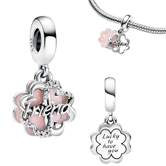 Sterling silver friendship flower charm with pink enamel and cubic zirconia, fits Pandora bracelet.