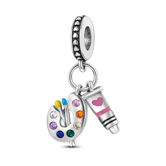 Sterling silver artist palette charm with enamel and crystal accents.