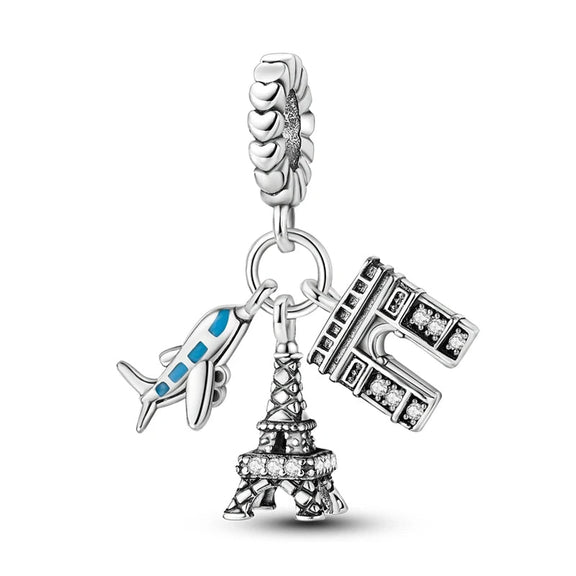 Paris Travel Sterling Silver Charm with Eiffel Tower, Arc de Triomphe, and Airplane - Sterling silver charm featuband the Eiffel Tower, Arc de Triomphe, and an airplane.