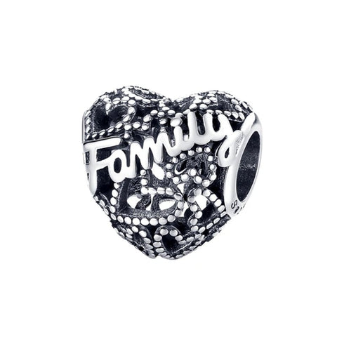 Sterling Silver Heart-Shaped Family Charm Intricate Filigree Design - Sterling silver heart-shaped family charm with filigree design.