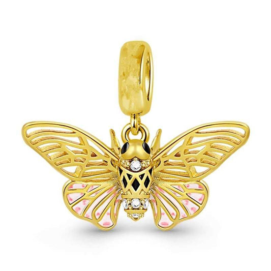 Gold butterfly charm with enamel accents