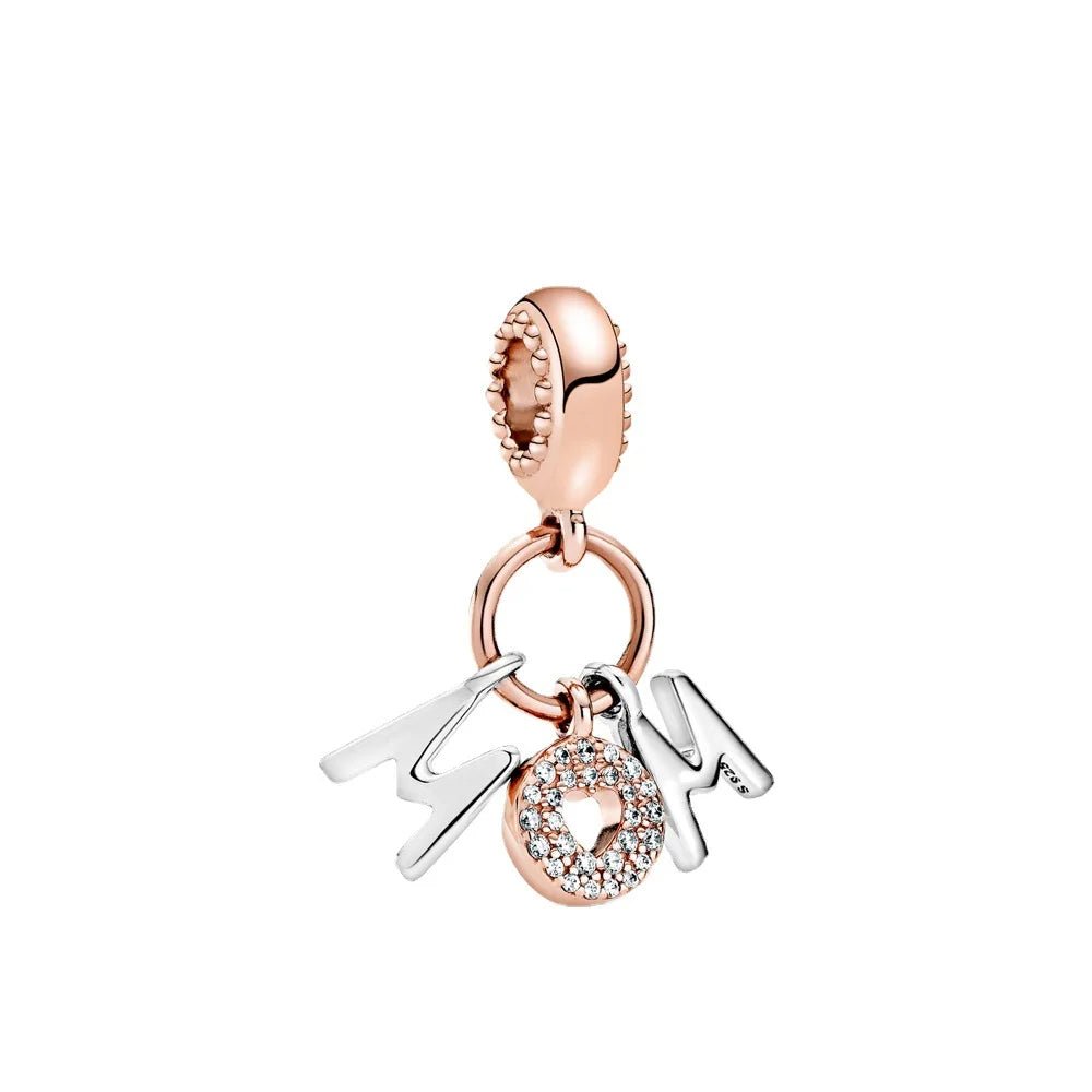 Rose gold "MOM" charm with sparkling details, ideal for sentimental Pandora bracelets and charms.