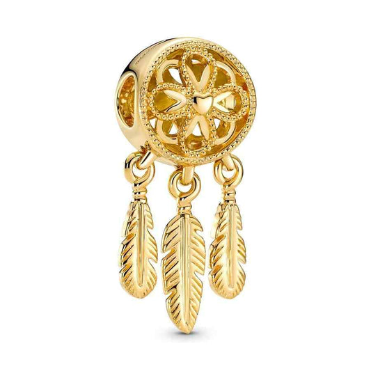 Gold feather charm with delicate details