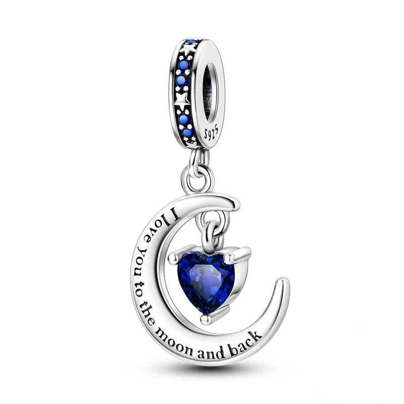 Sterling silver moon and back charm with blue heart