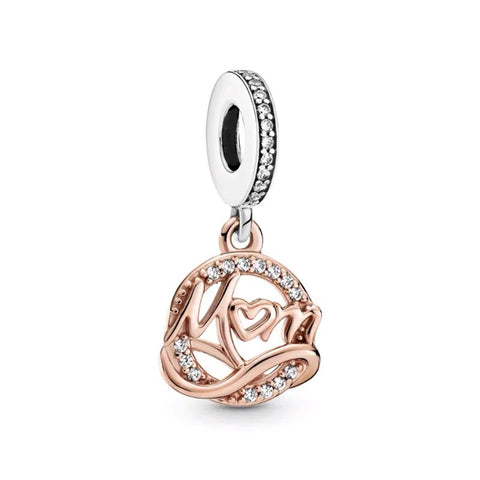 Rose gold charm with "Mom" script and crystals
