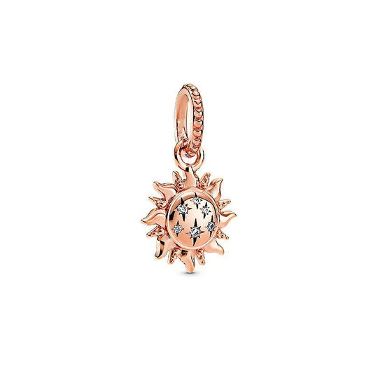 Rose gold sun charm with crystals