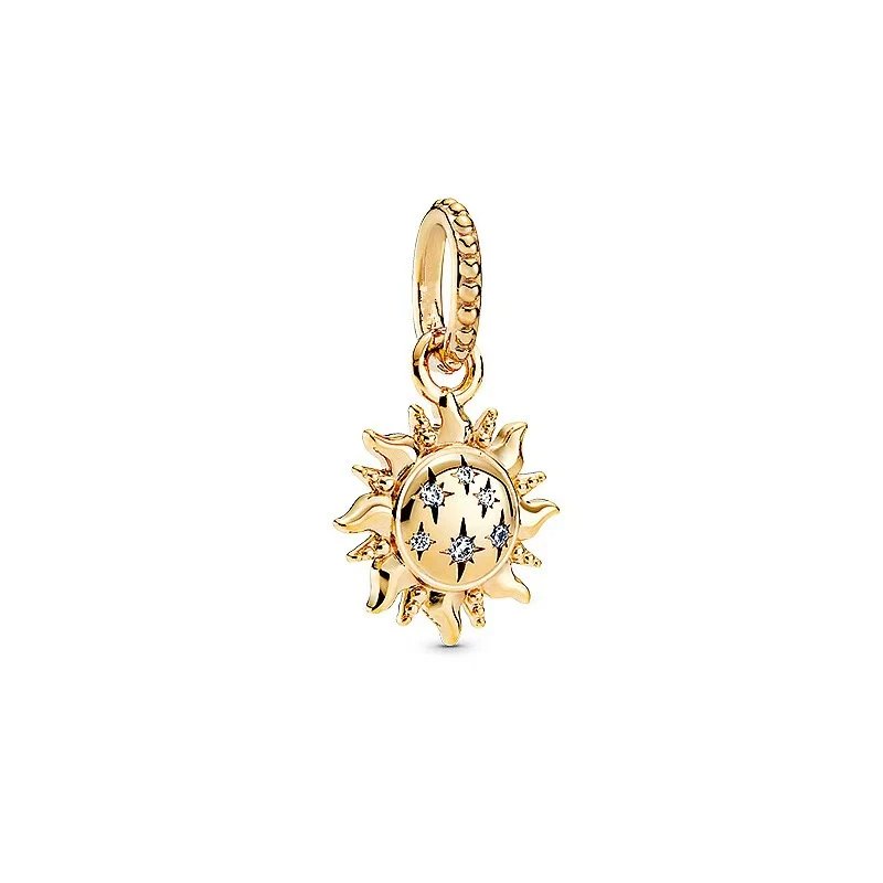 Gold sun charm with star detailing