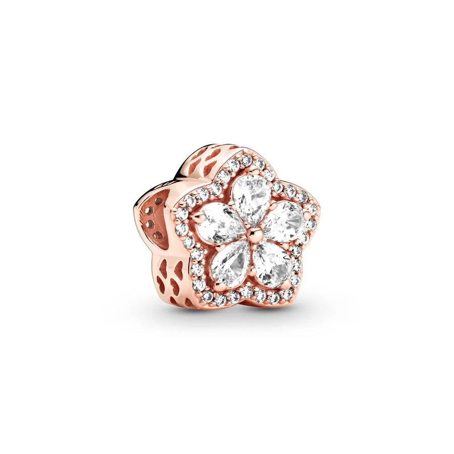 Rose gold charm with diamond-encrusted flower