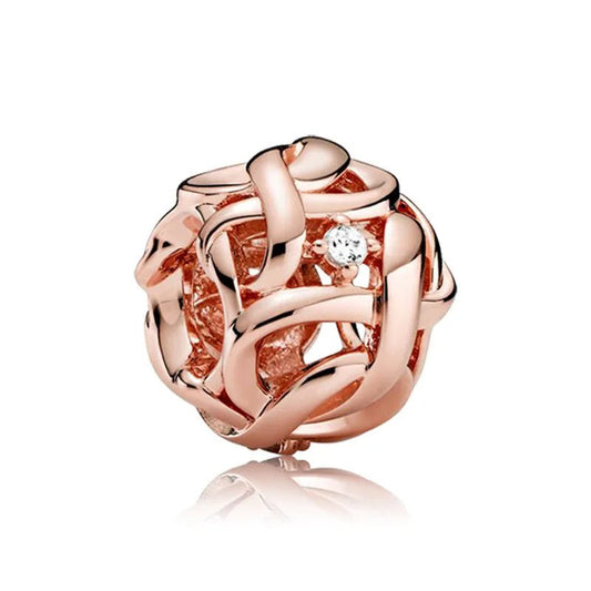 Woven Heart charm in rose gold with detailed weaving, fits Pandora bracelets
