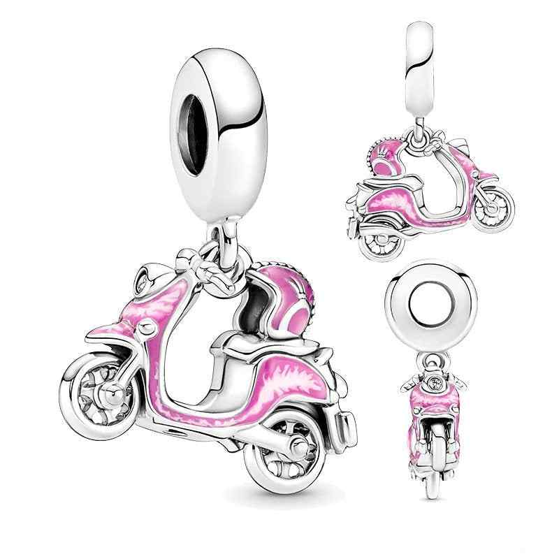 Sterling silver pink scooter charm with enamel detailing