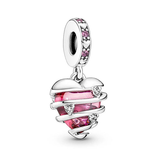 Sterling silver wrapped heart charm with pink center