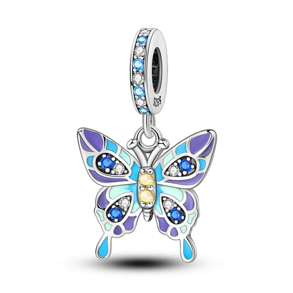 Vibrant Butterfly Sterling Silver Charm with Enamel and Gemstones - Sterling silver charm with enamel London Guard and Big Ben, featuband a blue gemstone on the bail.