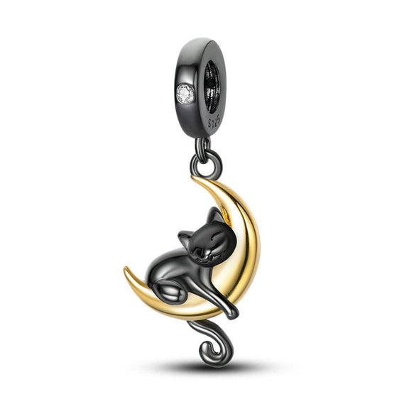 Sterling Silver Black Cat on Moon Charm - Sterling silver black cat on gold-plated crescent moon charm