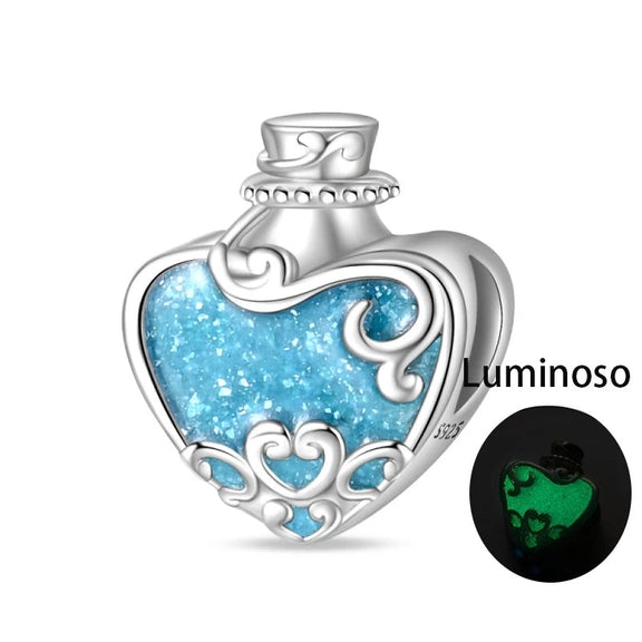 Luminous Heart Potion Bottle Sterling Silver Charm - Sterling silver heart potion bottle charm with luminous blue enamel that glows in the dark.