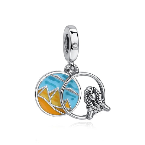 Egypt Pyramids & Pharaoh Sphinx Enamel Dangle Charm - Silver-tone dangle charm featuring a round enamel disc with golden pyramids and blue sky alongside a detailed pharaoh sphinx head with cubic zirconia accents