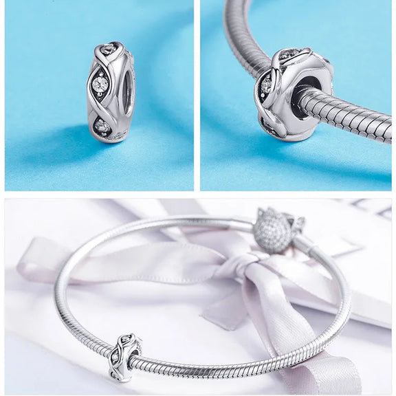 Elegant Twist Infinity Charm - elegant twist infinity charm with diamonds