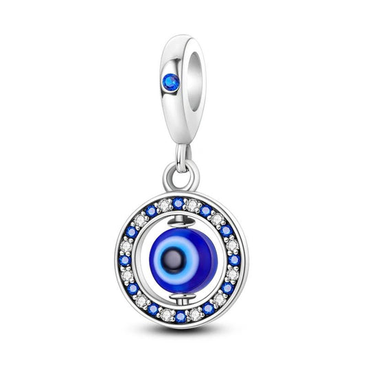 Evil eye charm with blue crystal accents, designed for protection and style, perfect for bracelets or necklaces.