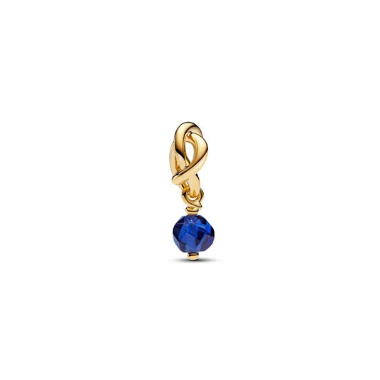 Faceted blue eternity circle dangle charm in Pandora Shine, adds a serene blue touch to bracelets