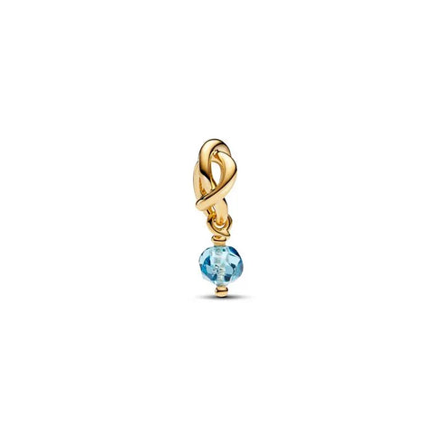 Faceted sea aqua blue eternity circle charm in Pandora Shine, a vibrant ocean-inspired addition