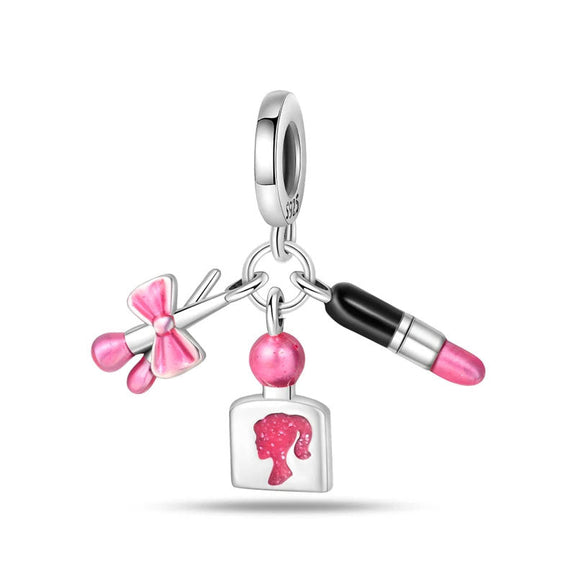 Sterling Silver Fashionista Charm - A sterling silver charm with lipstick, bow, and silhouette accents in pink enamel for the fashion-forward individual.