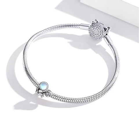 galaxy astronaut globe charm