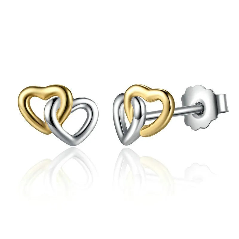 gold and silver intertwined heart stud earrings