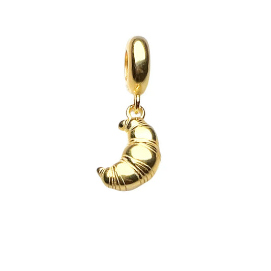 Golden croissant charm.