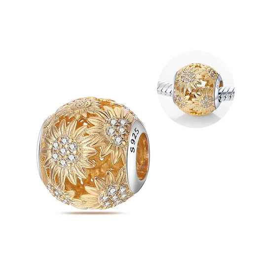 Golden floral ball charm featuring intricate sunflower details and crystal accents, ideal for nature lovers.