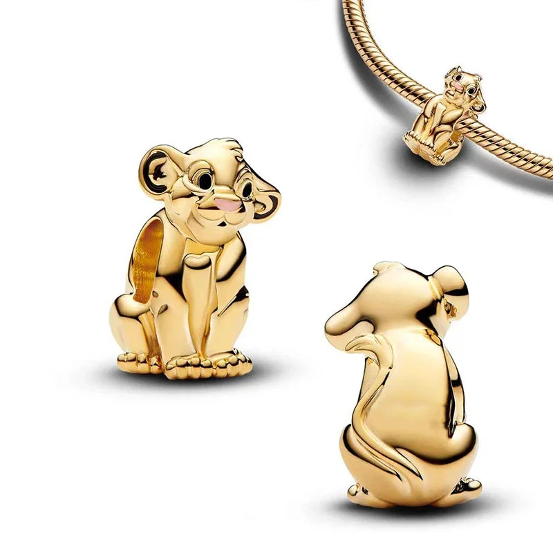 Golden Simba lion cub charm featuring detailed craftsmanship, perfect for animal lovers and fans of classic wildlife tales.