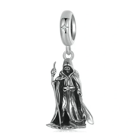 Silver grim reaper charm.