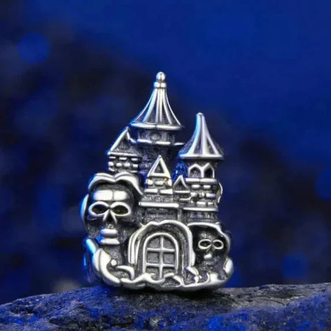 Silver skull castle charm.