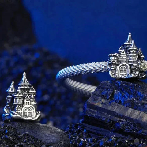 Silver castle charm.